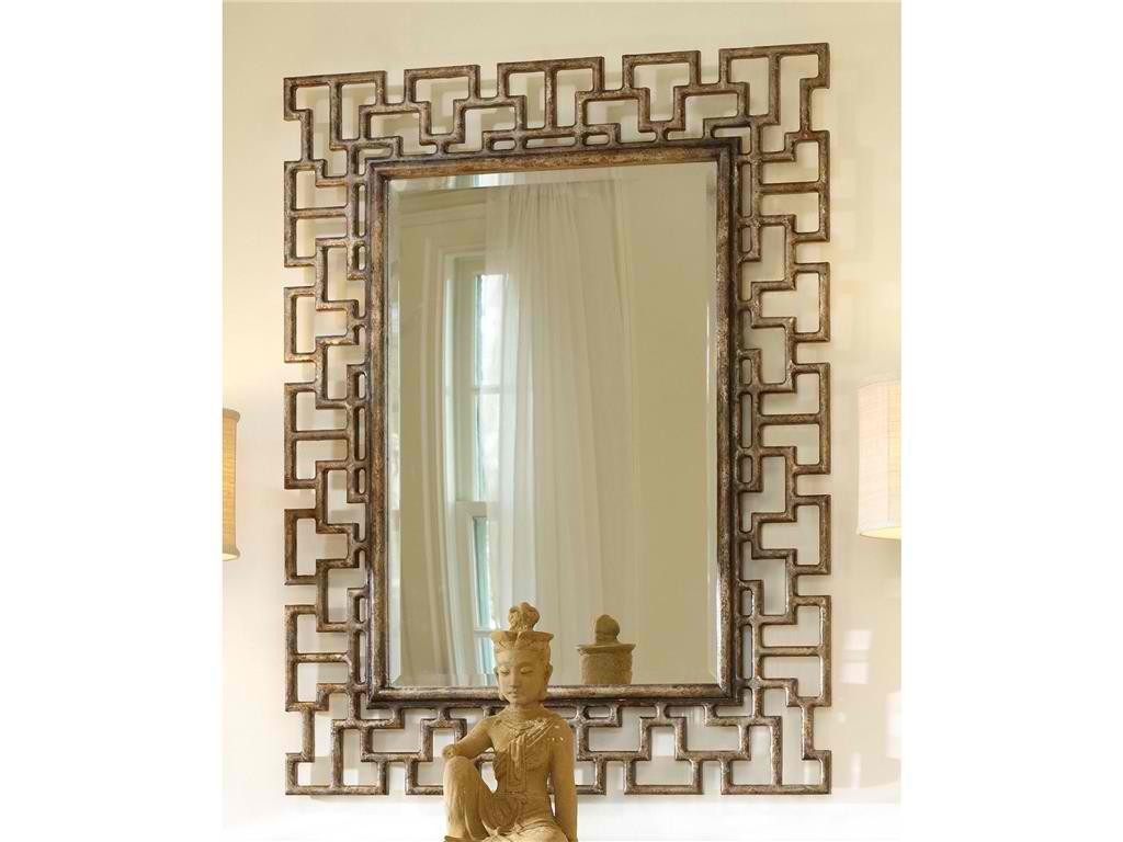 Hooker Furniture Accents Fretwork Mirror spells rustic especially when paired with the wooden Asian sculpture. 