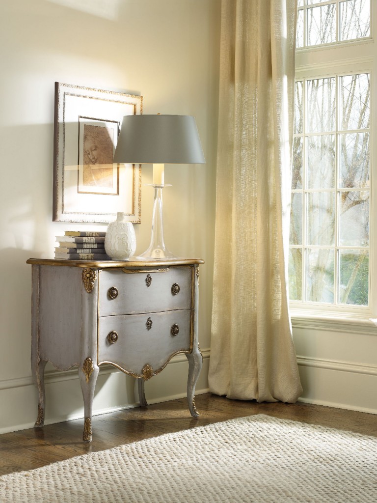 Hooker Furniture Living Room French Two Drawer Chest offers a distressed yet elegant optimization to the white walls.