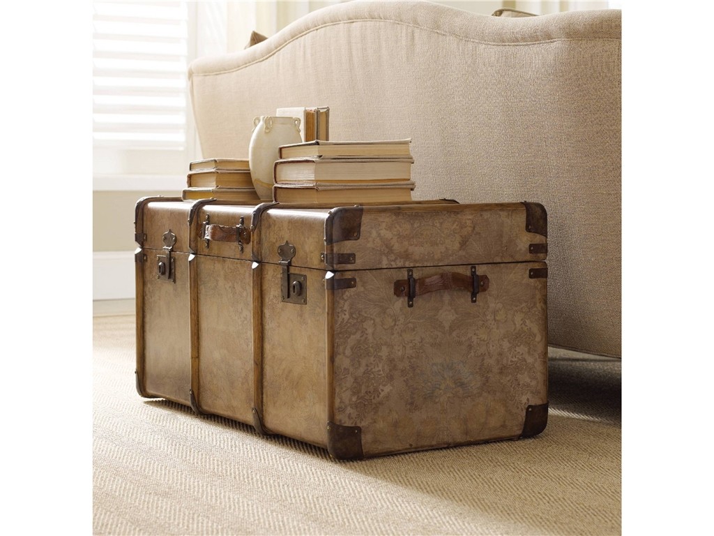 Look for furniture that can maximize the use of space in your home. This Hooker Furniture Living Room Lift Top Floral Cocktail Trunk doubles as decorative furniture at the foot of your bed while storing some of your stuff. 