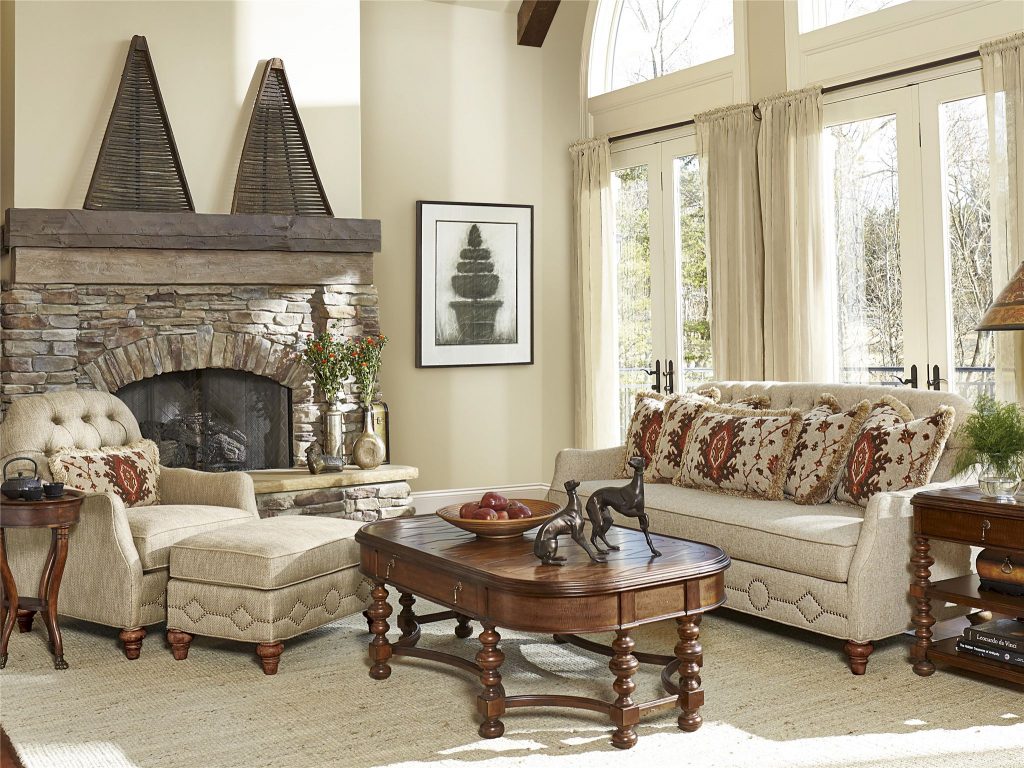 Fine Furniture Design Living Room Vestibule Tufted Back Sofa 4514-01 has tufted fabric that nestles effectively in this chiefly beige surroundings. The wooden pieces provide the necessary contrast. 